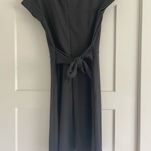 Loft size 8 black cap sleeve dress with tie at waist. Above knee. Ribbed.